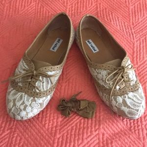 Tan and white shnazzy flats